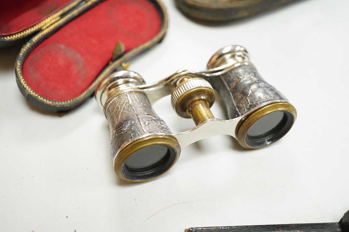 A Le Coultre desk timepiece, and four pairs of opera glasses